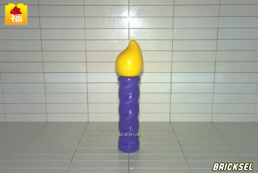 Свечка с фиолетовым воском и желтым огнем